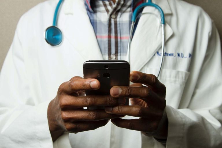 doctor on healthcare technology mobile application