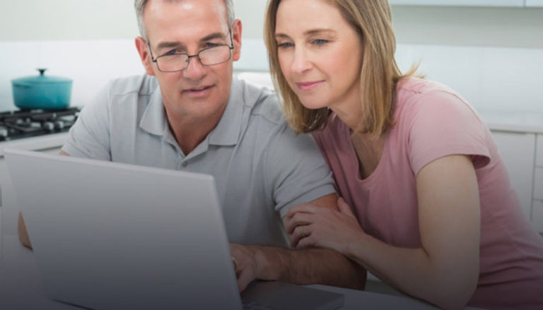 older couple using estate assist website